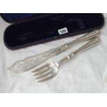 A pair of Victorian fish servers, attractively engraved, fitted case 1876 by J. G