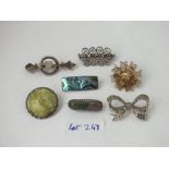 Seven various silver brooches