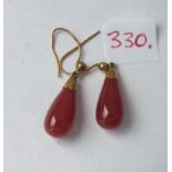 Pair of gold mounted cornelian pear shaped ear pendants