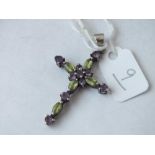 A peridot & amethyst cross