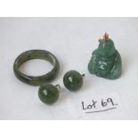 A green hard stone Buddha, a ring and a pair of ear studs