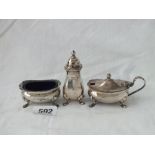 A three piece cruet set on pad feet, 122g excluding liners