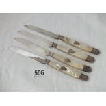 A set of four French silver bladed knives with MOP handles