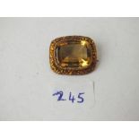 An antique gold mounted citrine brooch, 5.7g