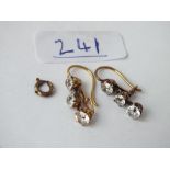 A pair of paste ear pendants set in gold