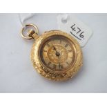 Ladies 18ct gold fob watch, the back with enamel flowers