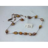 A foil glass bead necklace