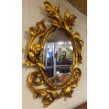 GILT FRAMED BEVELLED EDGE MIRROR DECORATED WITH SWAGS