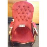 EARLY 20TH CENTURY BURGUNDY COLOURED BUTTON BACK ARMCHAIR