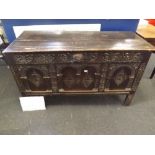 ANTIQUE COFFER WITH CARVED PANELLED FRONT