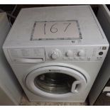 HOT POINT WASHING MACHINE (NEEDS A NEW DOOR BOOT)