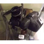 OLYMPUS OM 1 WITH VARIOUS LENSES INCL; A VIVITAR MACRO LENSE & CAMERA BAG