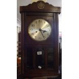 OAK FRAMED PENDULUM WALL CLOCK