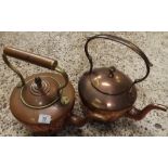 A PAIR OF COPPER KETTLES