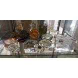 SHELF OF VARIOUS GLASS PAPERWEIGHTS