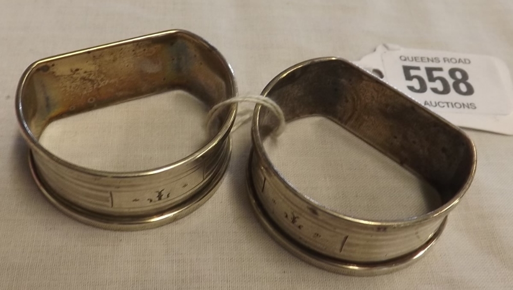 A PAIR OPF SILVER 'D' SHAPED NAPKIN RINGS - BHAM 1937