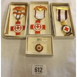 FOUR BOXED EFFICIENCY RED CROSS MEDALS