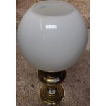 BRASS OIL LAMP WITH GLOBE SHAPE SHADE