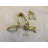 Asweet of 9ct gold & jade jewellery including 5 panel bracelet, a matching pendant & matching drop