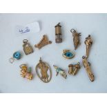 12 assorted charms in 9ct
