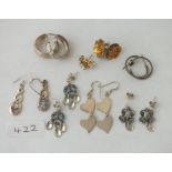 Eight pairs of silver earrings