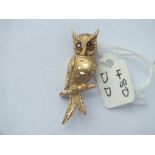 Attractive owl on branch brooch with red bead eyes in 9ct