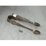 Pair of cast pierced sugar tongs & a pair of Irish Kings pattern tongs - Dublin 1937 by WC