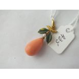 Unusual vintage gold pendant in the form of a pear, suspending a coral fruit with enamel leaves &