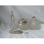 Three silver mounted jars & a nail buffer