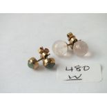 Two pairs of 9ct ear studs