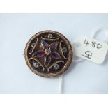 Gold garnet & stone set circular brooch