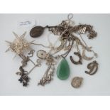 Bag containing assorted silver pendants & charms - 50gms