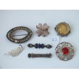 Seven assorted silver brooches