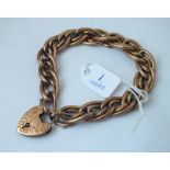 9ct double curb link bracelet with heart padlock