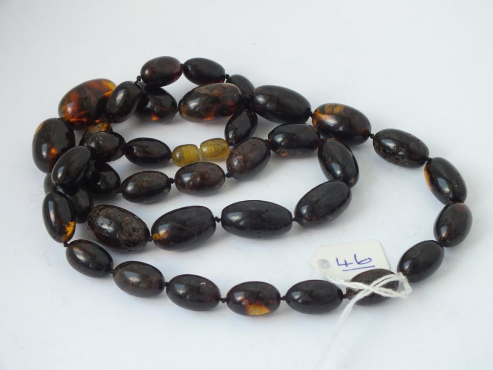 String of rare oval amber beads - 48.9gms