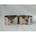Pair of napkin rings - one pierced with fish & the other with an owl - London