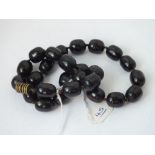 String of dark cherry amber beads - 53.7gms