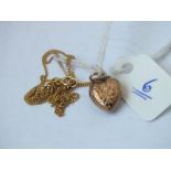 Small 9ct heart shaped locket on a 9ct neck chain