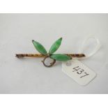 Attractive bamboo leaf brooch, set with apple green jade, stamped 14ct