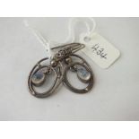 Pair of oval silver openwork earrings with central moonstone, hook fittings