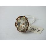 Large yellow stone set ring in 9ct - size N