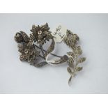 Two silver & marcasite floral brooches