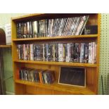 TWO SHELVES OF MIXED OF DVD'S & A PART SHELF OF CD'S