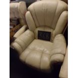 CREAM COLOURED LEATHERETTE ARMCHAIR