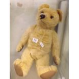 A VINTAGE BLOND TEDDY BEAR