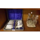 CASED SET OF FISH KNIVES & FORKS & A GLASS CONDIMENT SET ON SILVER PLATED STAND