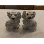 A PAIR OF STAFFORDSHIRE DOGS A/D