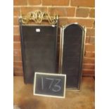 A BRASS & BLACK METAL FOLDING FIRE SCREEN