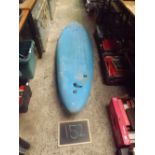 A 6FT BLUE SURF BOARD