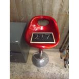 A RED & CHROME BAR STOOL